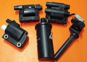 Diagnostic-Solutions-Ignition-Coil-Diag-1 Photo 1: Most technicians are familiar with oil-filled (center), epoxy-filled (left), e-core, waste-spark and pencil-type (right) ignition coils.
